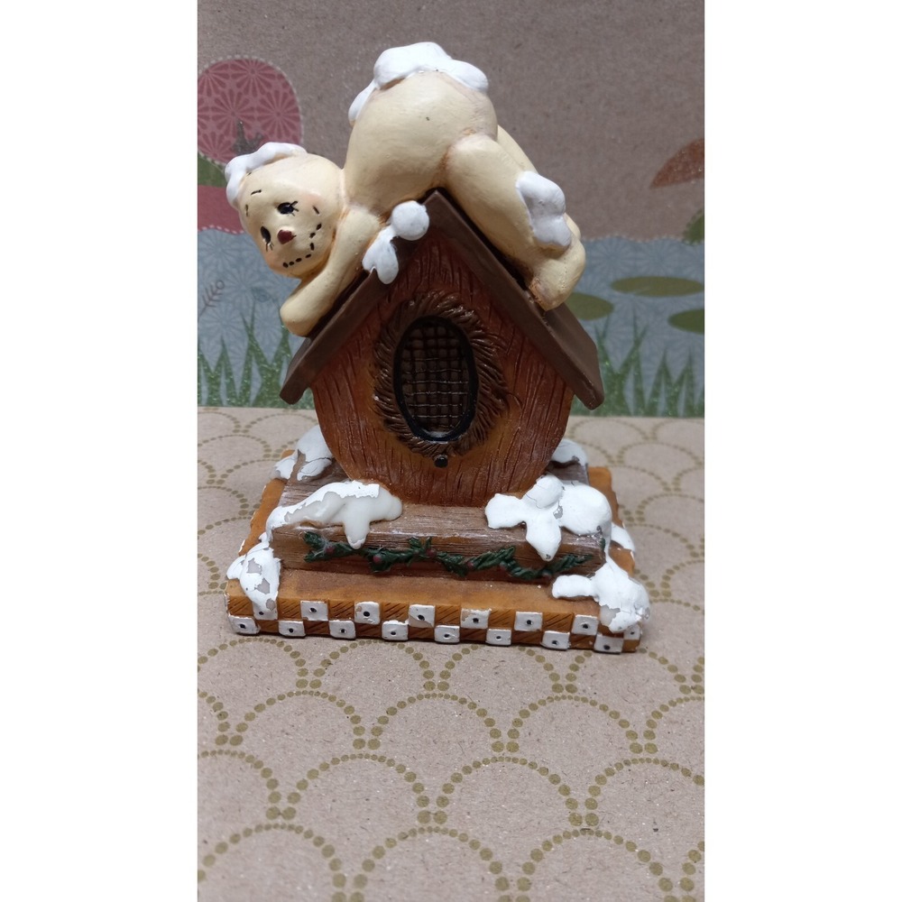 Snowman Jaime Mills-Price figure on birdhouse winter decoration art display